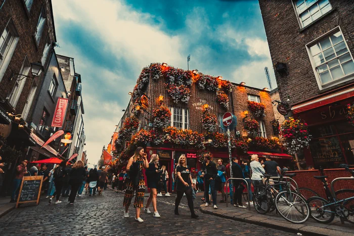 The Temple Bar pub on a busy street in Dublin, Ireland