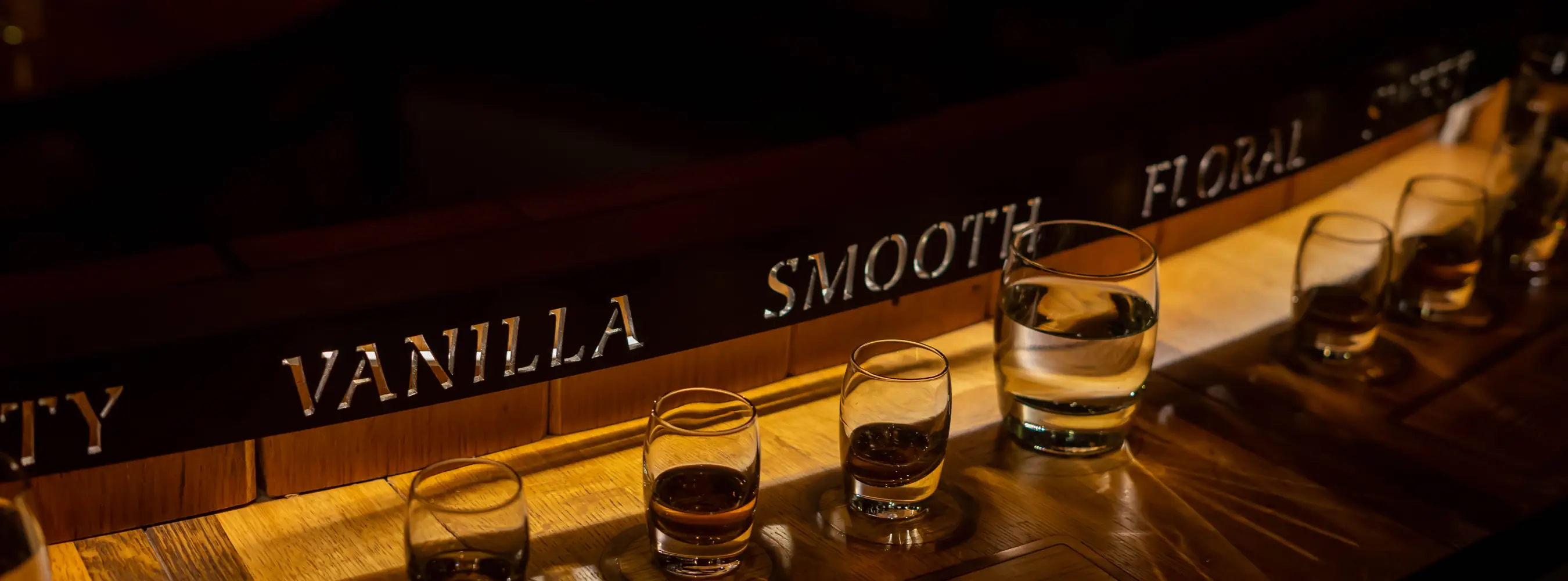 Whiskey tasting flight on a bar at an Irish distillery